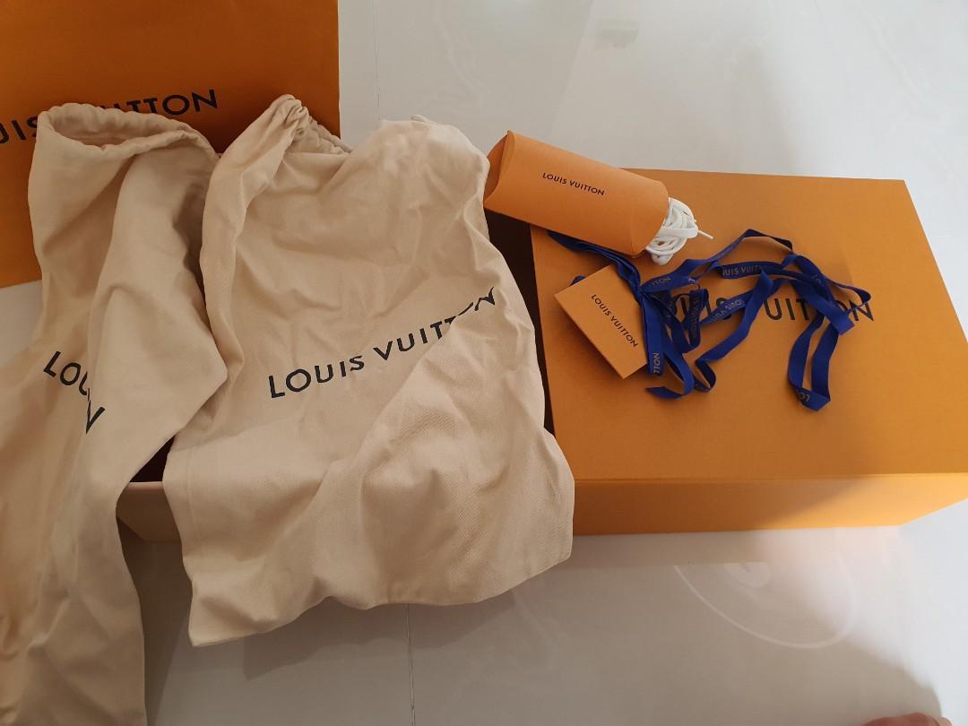 Louis Vuitton large box that slides and dust bags in new condition