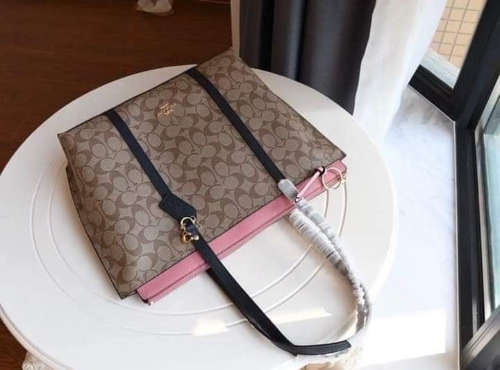 may tote with signature canvas detail