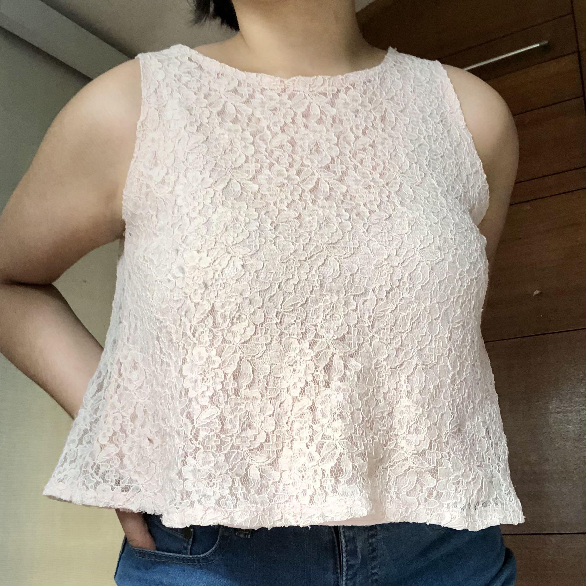 Pink Lace Shortsleeve Top (Category: Blouses) located in Quezon City. Submitted by _prelovedlovely (Listing ID 1116545174, Image 1). Description: Sheer in the back, model is size M.
