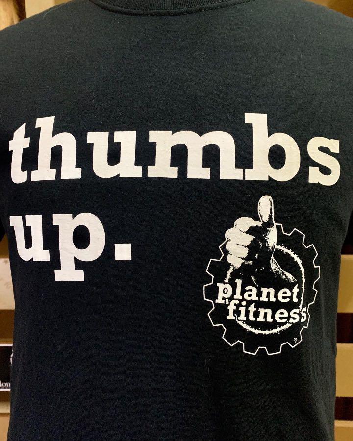 Planet Fitness Thumbs Up Men's Black Graphic T-Shirt, Men's Fashion, Tops &  Sets, Tshirts & Polo Shirts on Carousell
