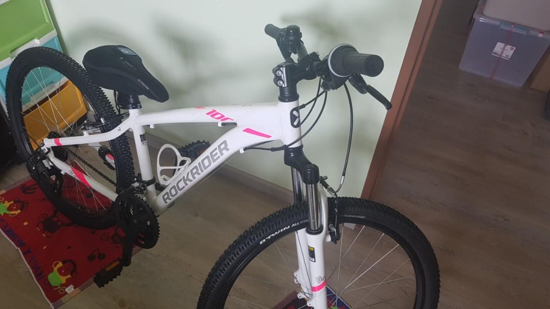 White and pink mountain bike on sale