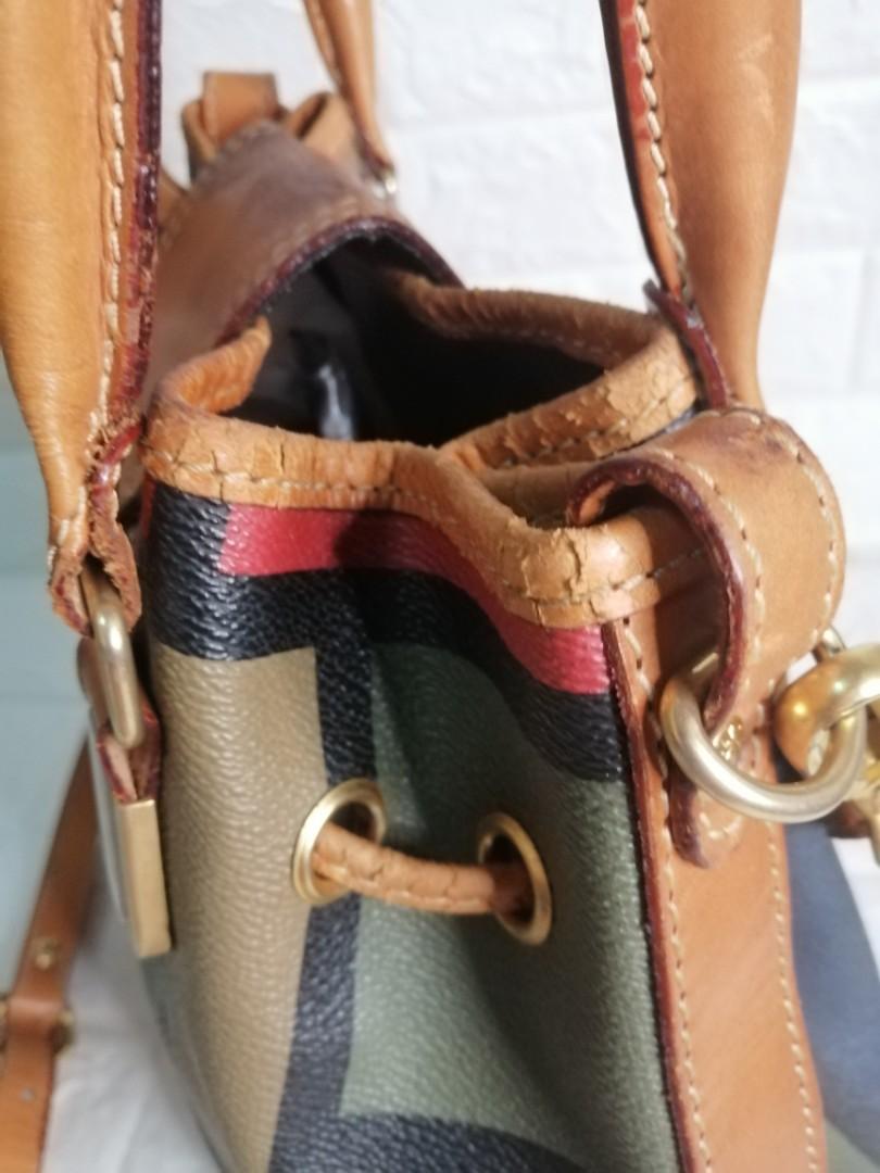 Double Fish Bucket 2-way with Sling Bag (Category: Luxury Bags & Wallets) located in Las Pinas. Submitted by etoksi1234 (Listing ID 1111268641, Image 3). Description: Pre-loved double fish bucket 2-way with Sling bag... With watermarks on some part of the leather.. Please see photos for reference... With signs of usage on the leather (crackings)... Made in Japan... Please manage your expectations. All sales are final. Kindly examine pictures care
