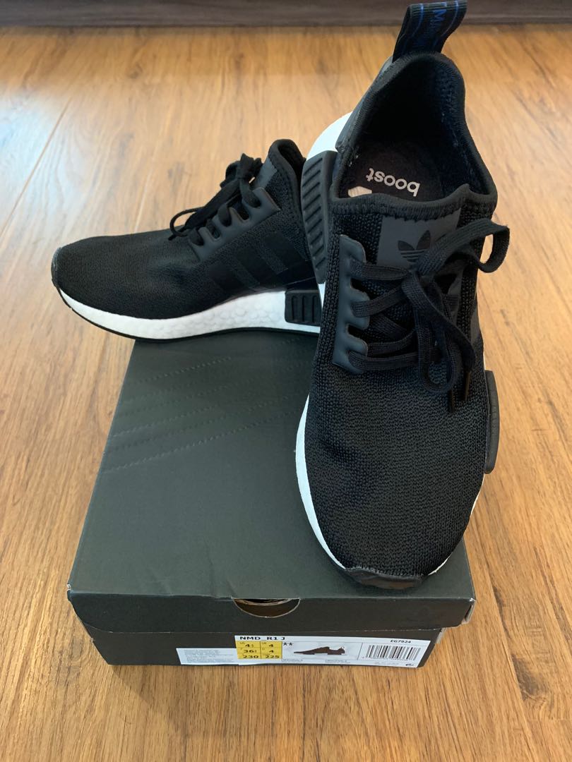 nmd black junior