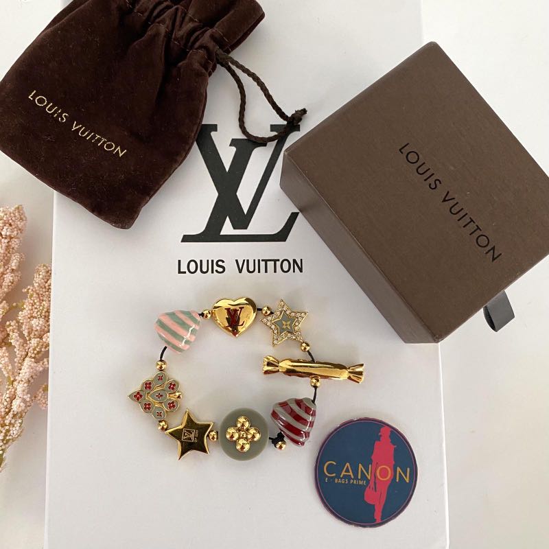 Louis Vuitton Goldtone Metal and Leather Candy and Star Necklace - Yoogi's  Closet
