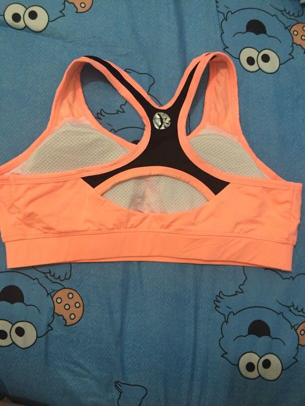 Neon orange sports bra (Category: Activewear) located in Orani. Submitted by simplyara (Listing ID 1116692017, Image 2). Description: Medium to large Padded Color may vary due to lighting Payment thru gcash.