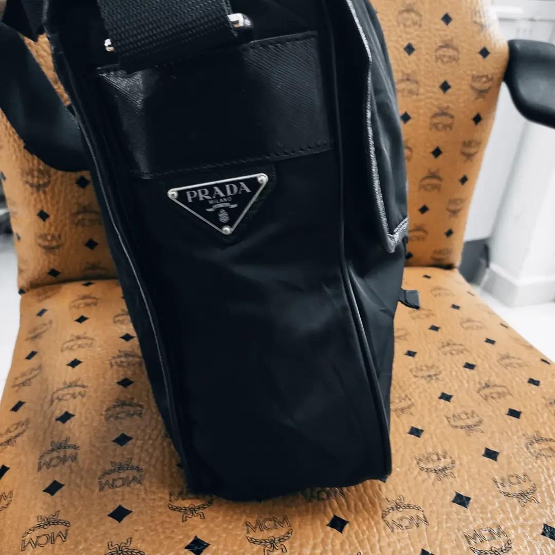 Prada sling sale bag mens price