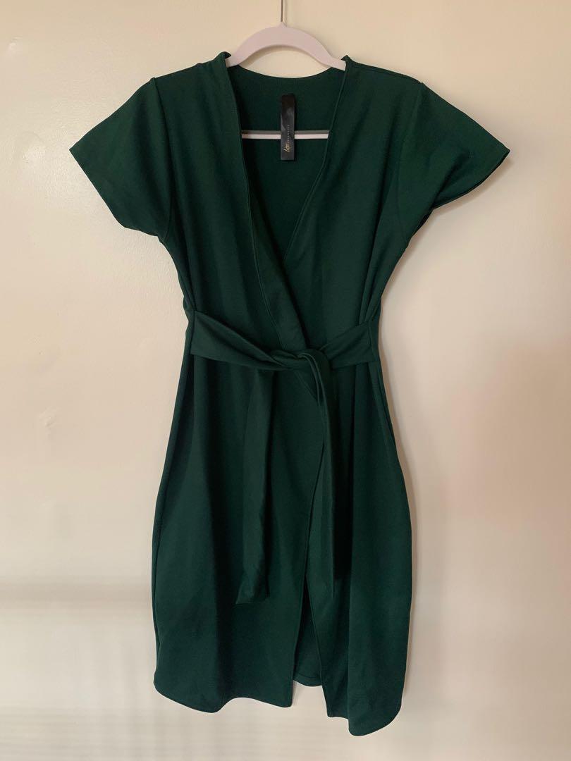 Dark Green Short Sleeves Cardigan (Category: Others Tops) located in Quezon City. Submitted by 3cshub (Listing ID 1111540784, Image 1). Description: Size: M - never been used but without tag Price is still negotiable. Message me for more details! :).