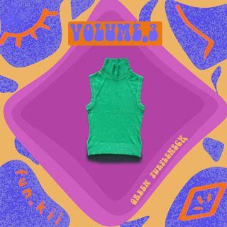 green sleeveless turtleneck