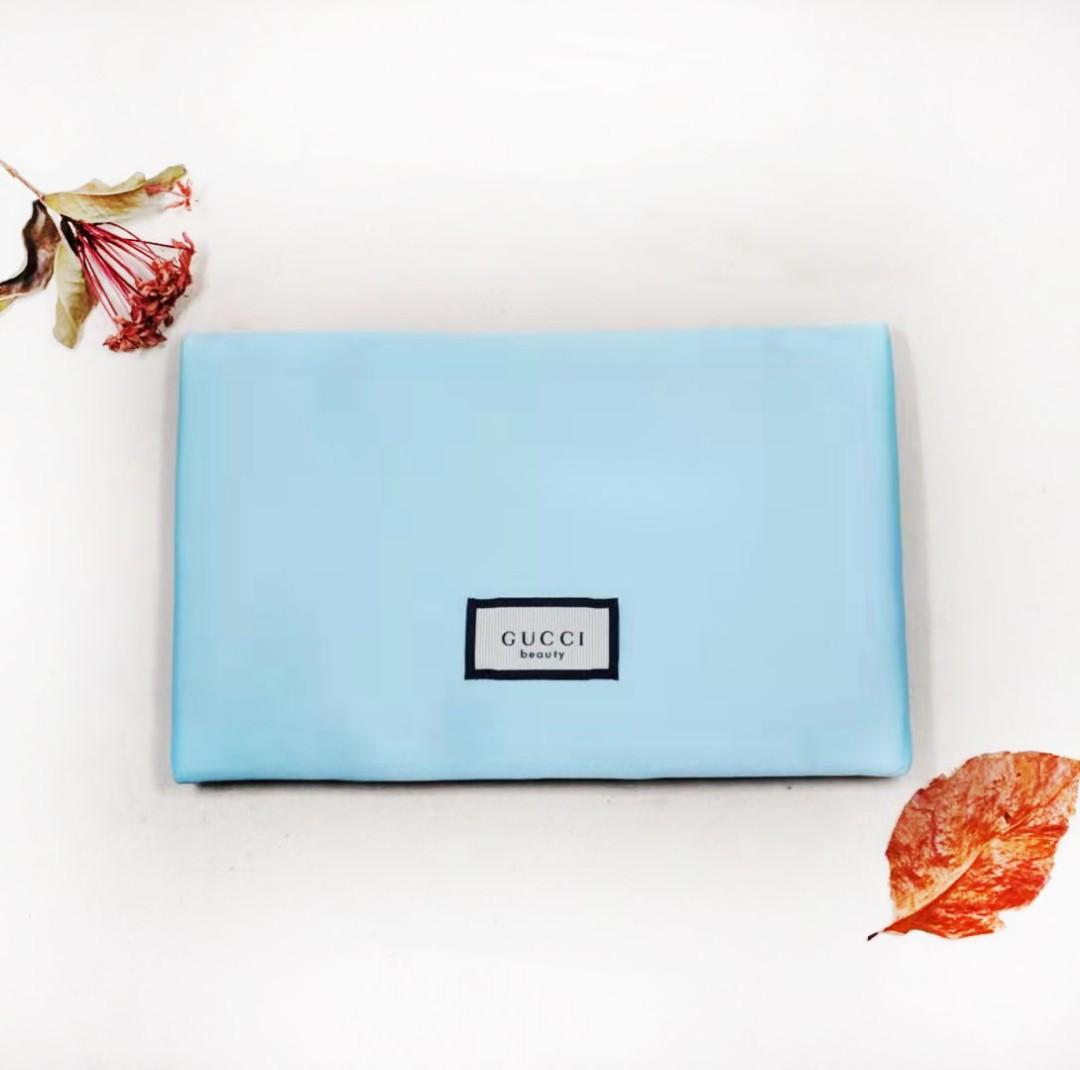GUCCI FEMALE POUCH GUILTY REV 19