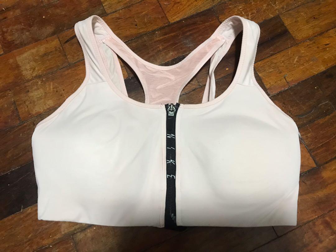 Nike Zip up Sports Bra (Category: Activewear) located in Quezon City. Submitted by raphavilla (Listing ID 1111630953, Image 1). Description: Light pink Medium Fits like small.