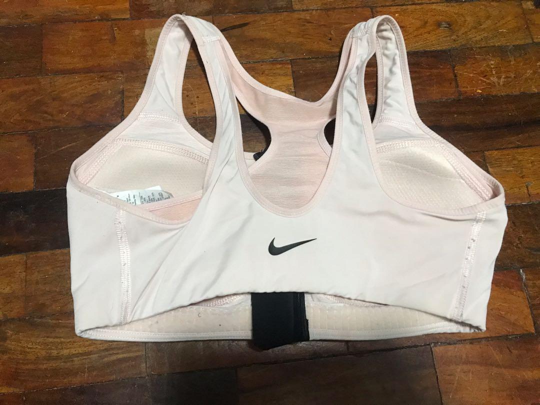 Nike Zip up Sports Bra (Category: Activewear) located in Quezon City. Submitted by raphavilla (Listing ID 1111630953, Image 2). Description: Light pink Medium Fits like small.