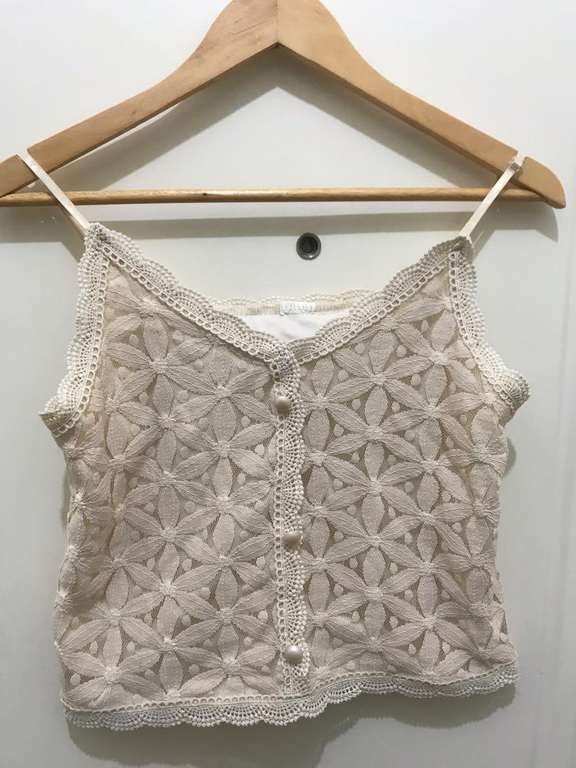 Top Bundle (Category: Shirts) located in Pasig City. Submitted by tinld (Listing ID 1111582418, Image 2). Description: Get 2 for 250 only plus shipping! 1 tropical sleeveless (SM, orig price 499) 1 nude camise, used only once (Pop Chic, original price 599).