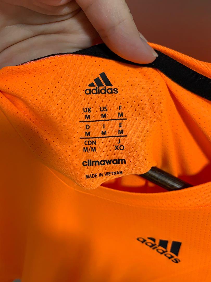 Adidas store orange fluo
