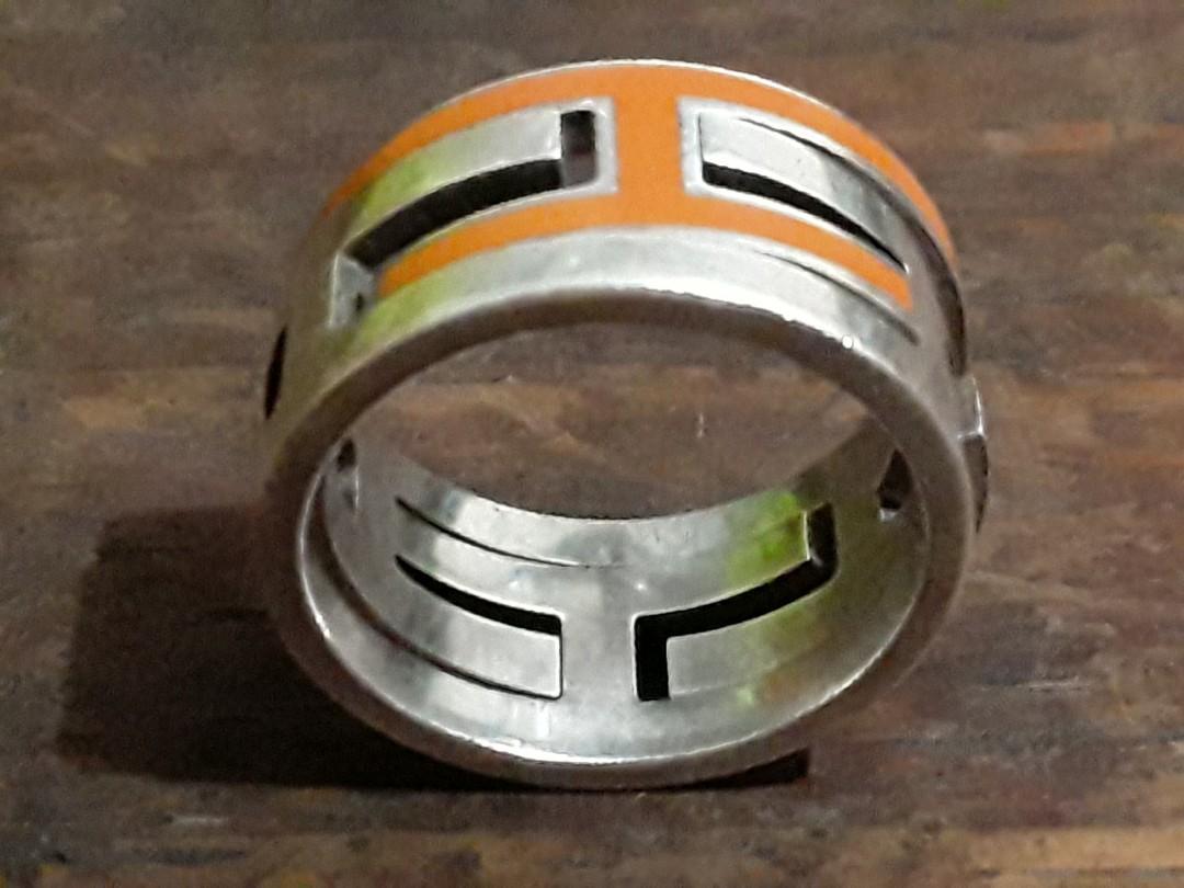 Hermes Move Ring (Category: Luxury Accessories) located in Makati City. Submitted by silver_ben (Listing ID 1111799329, Image 1). Description: Authentic Orange Enamel Hallmarked HERMES Ag925 50 Made in France.