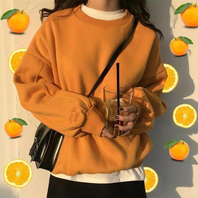 Pastel orange sweatshirt on sale