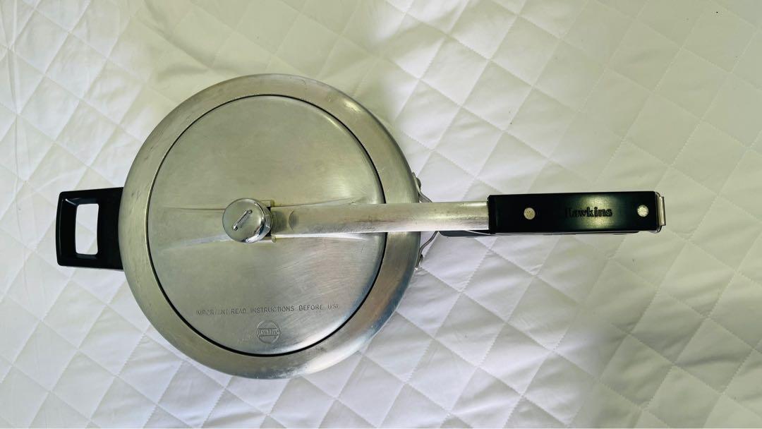 Pressure cooker 5 liters Hawkins Made heavy base and can be used on induction stove or conventional gas flame stoves both. Good for high volume