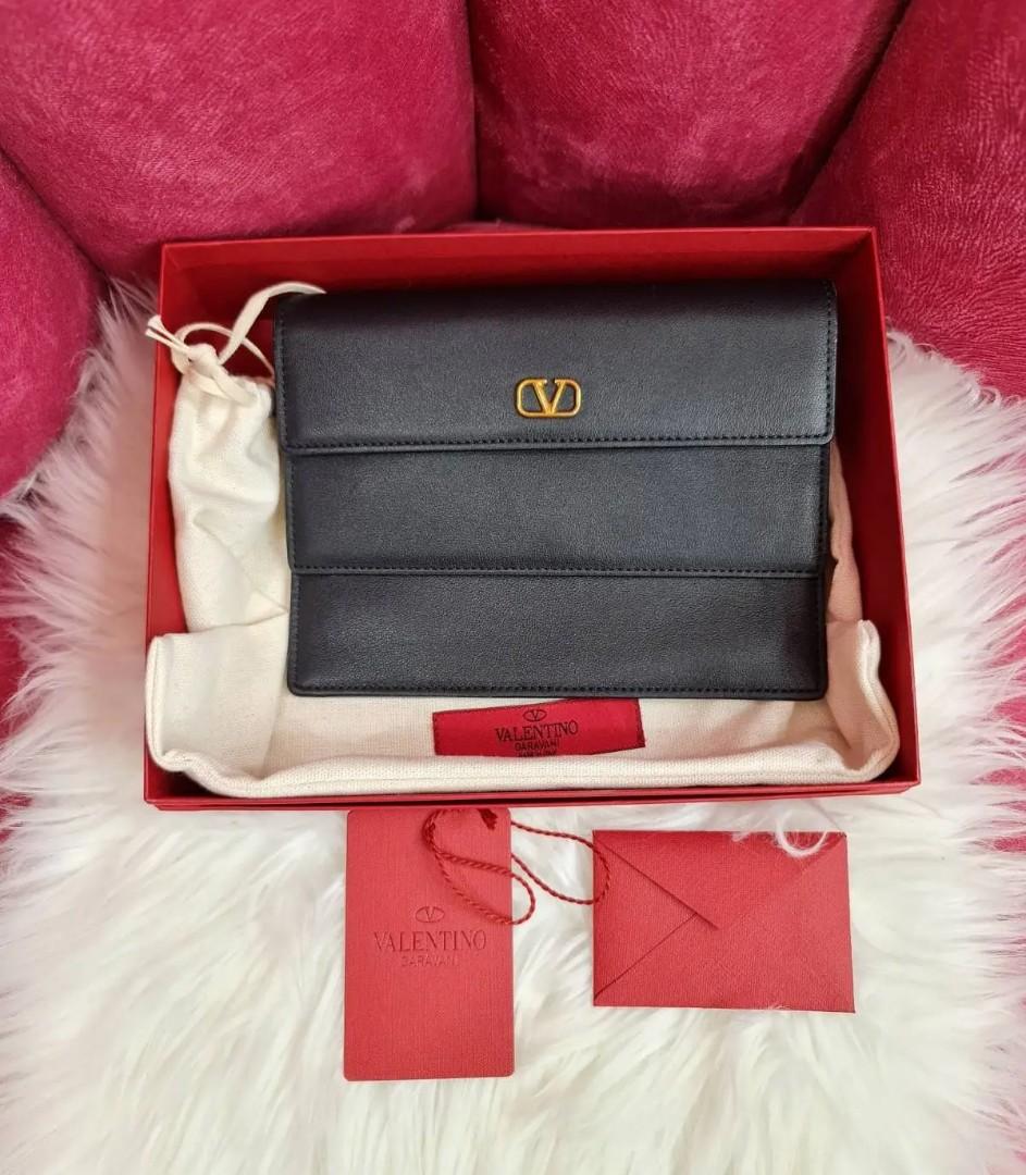 Valentino clutch/pouch (Category: Luxury Bags & Wallets) located in Manila. Submitted by dendc (Listing ID 1111818500, Image 2). Description: brand new Valentino pouch comes complete.