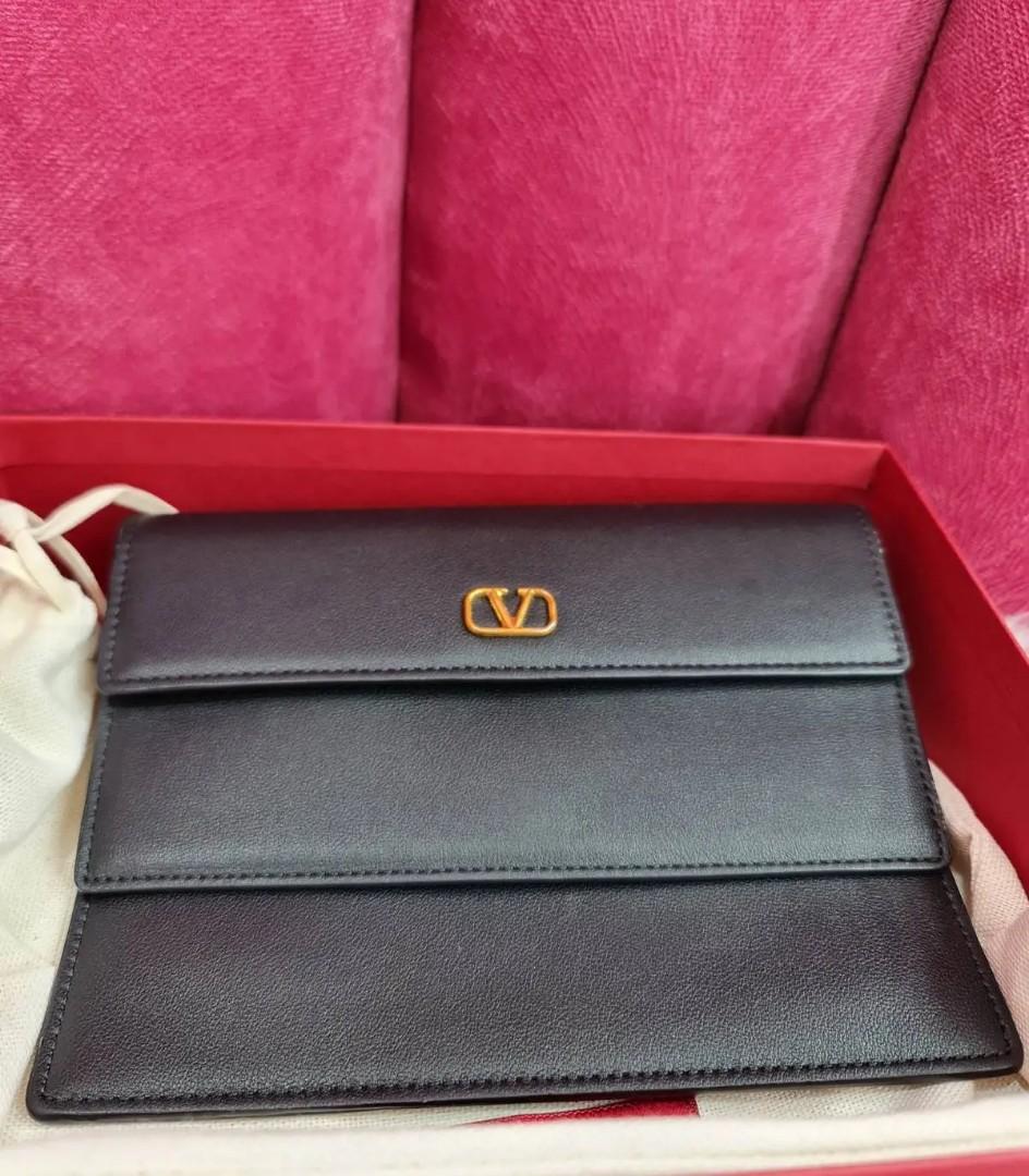 Valentino clutch/pouch (Category: Luxury Bags & Wallets) located in Manila. Submitted by dendc (Listing ID 1111818500, Image 3). Description: brand new Valentino pouch comes complete.