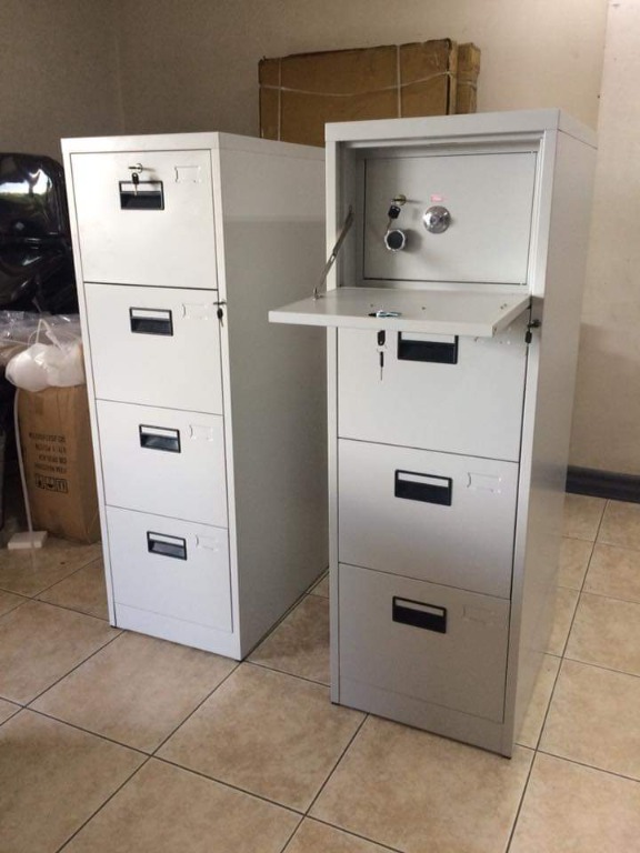 Steel cabinet top with vault