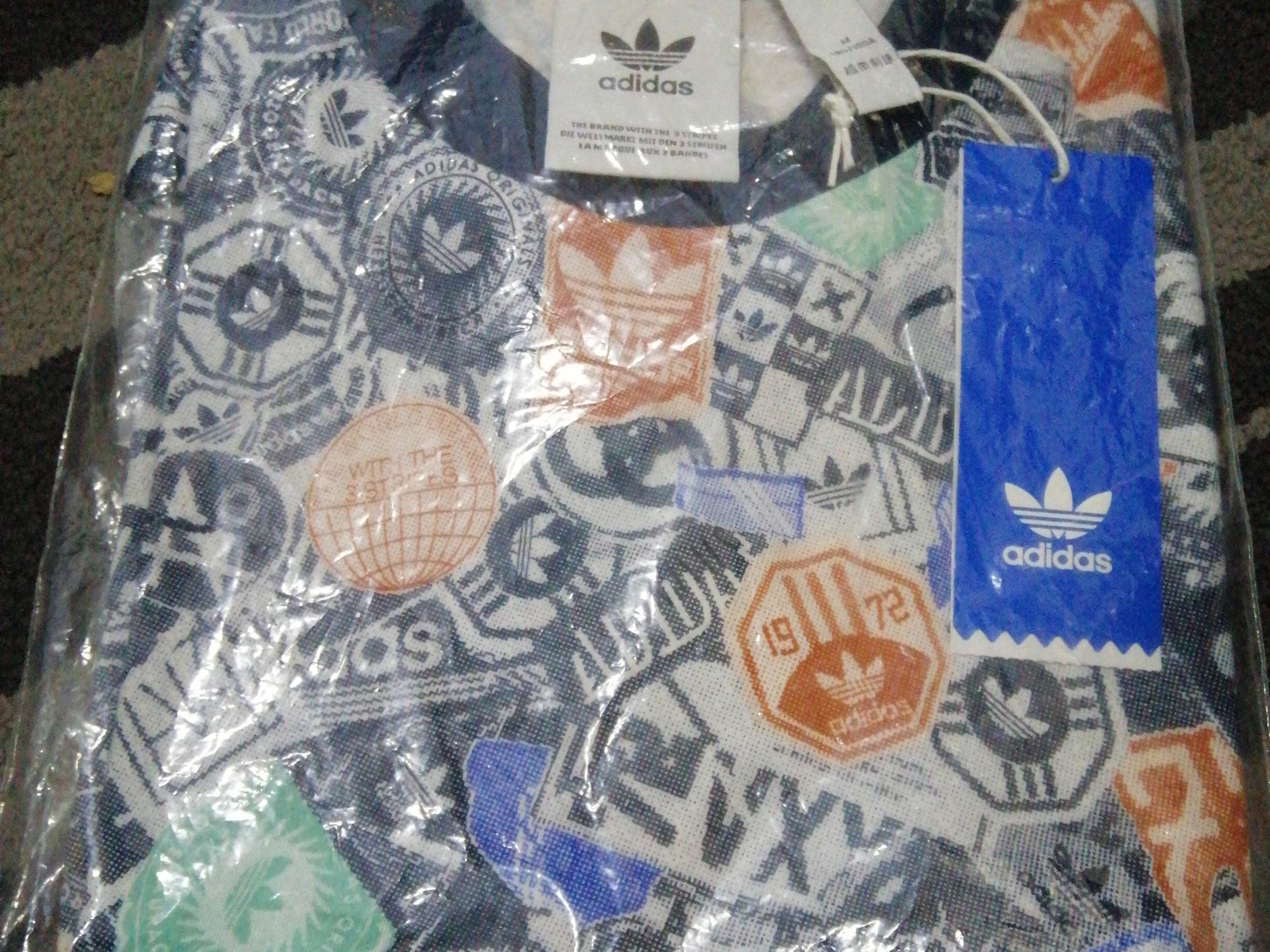 Adidas sticker bomb tee