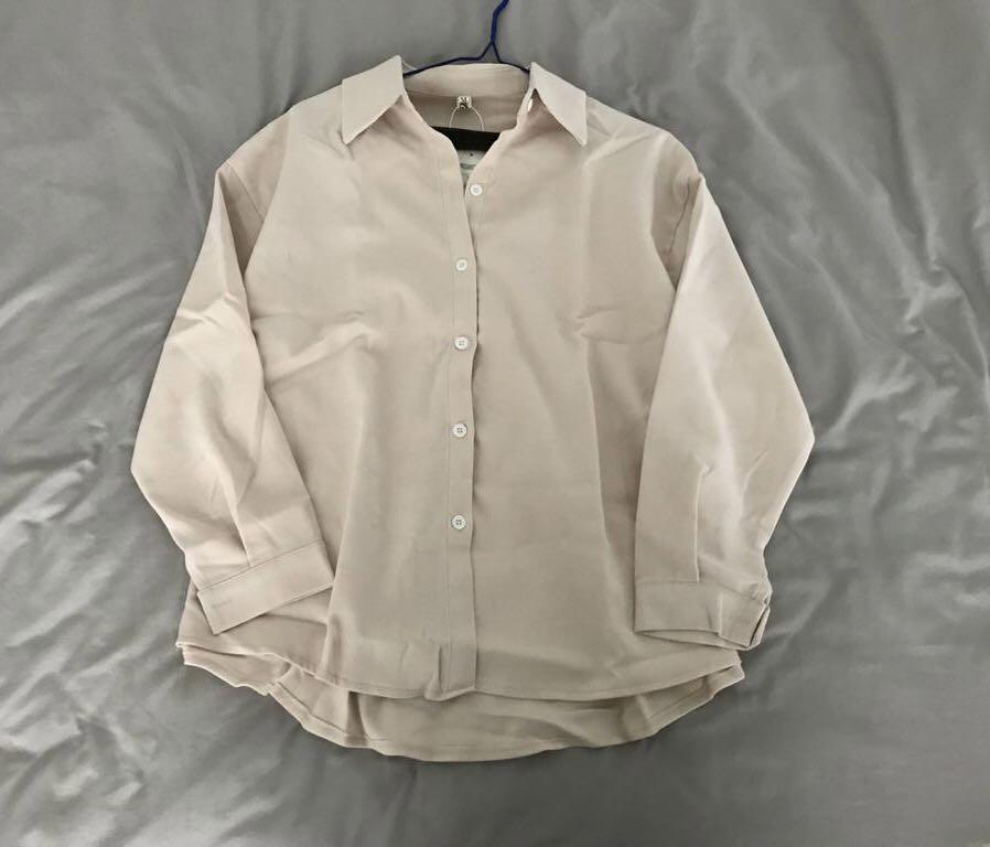 beige button up shirt