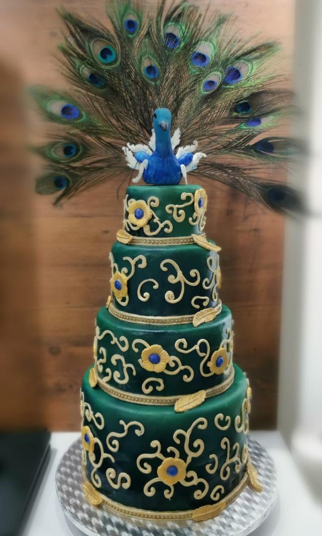 Peacock inspired wedding cake - Decorated Cake by - CakesDecor
