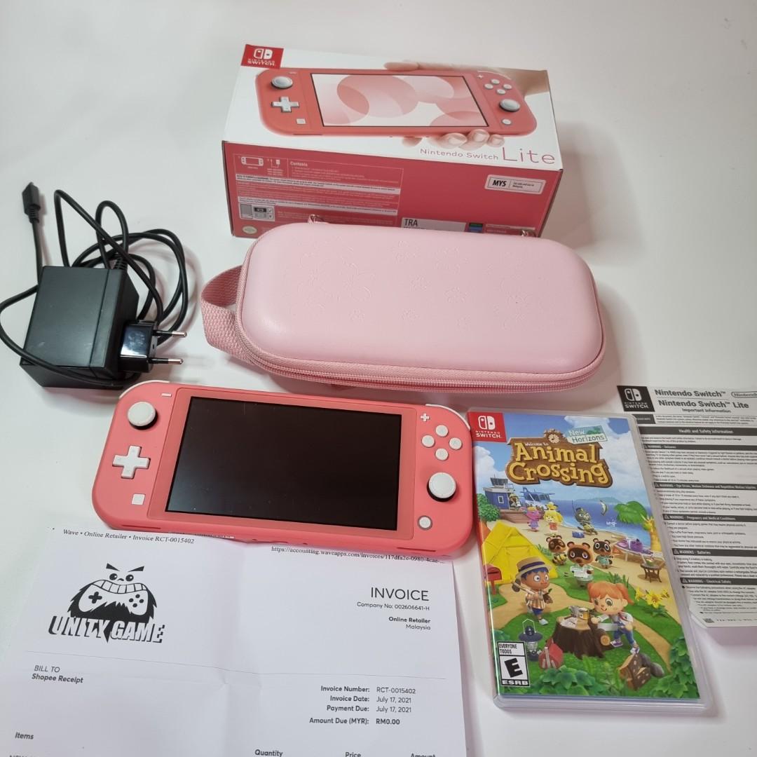 Nintendo Switch Lite In Coral With Mario Rabbids And Accessories