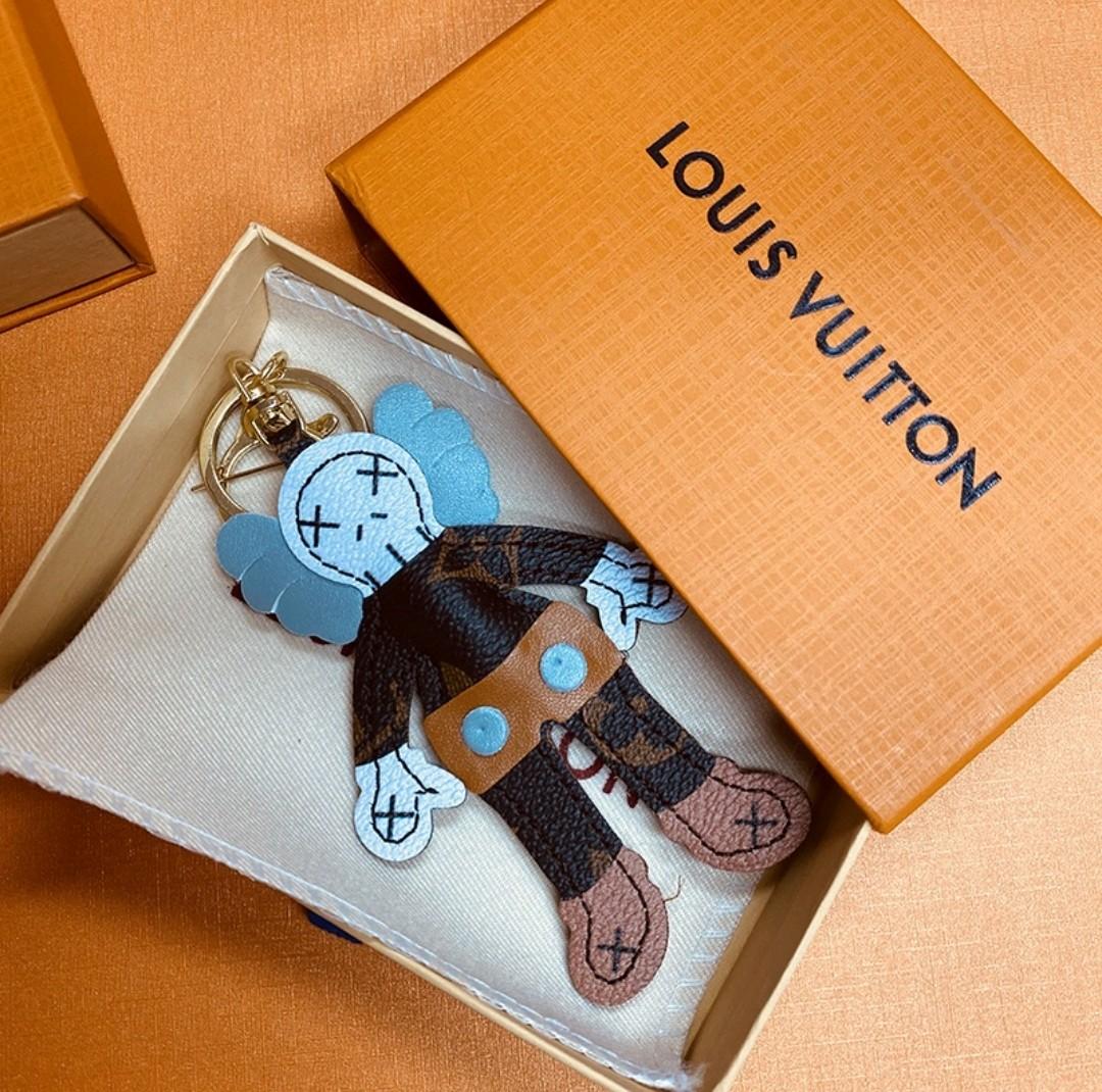 Louis Vuitton Kaws Bag Charm & Key Holder, Women's Fashion, Jewelry &  Organisers, Accessory holder, box & organisers on Carousell