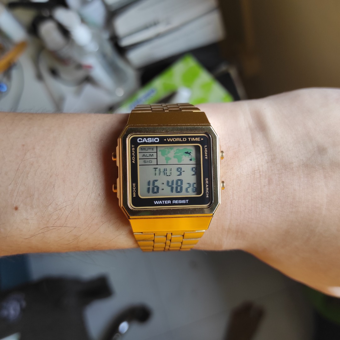 Gold casio hotsell world time