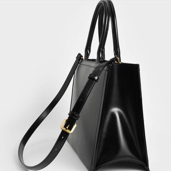 CHARLES AND KEITH LARGE TOTE BAG BLACK (Category: Luxury Bags & Wallets) located in Manila. Submitted by toughavenuesg (Listing ID 1112641676, Image 3). Description: 💯 ORIGINAL NEW INCLUDES ALL: DUST BAG PAPER BAG CARDS COLOR: BLACK CAN FIT LAPTOP 💻 Cheaper than store price!!!.
