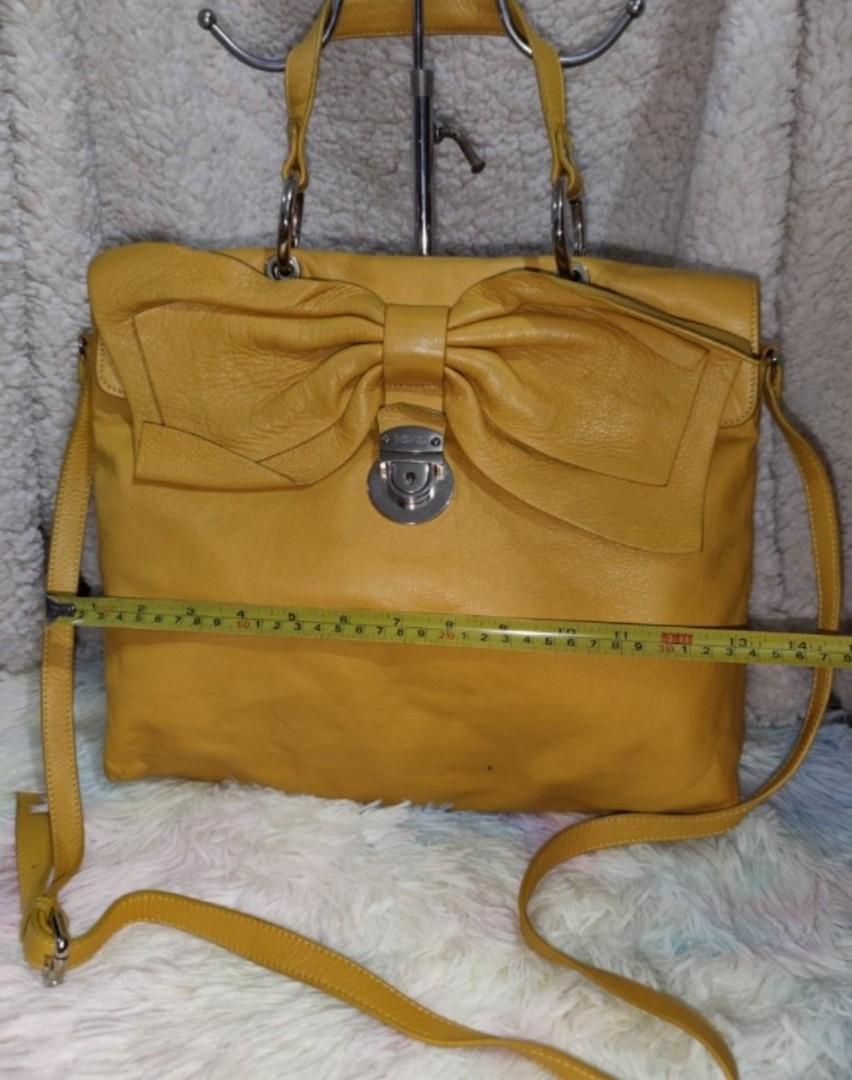 Red Valentino Bow Embellished Leather Bag (Category: Luxury Bags & Wallets) located in Pasig City. Submitted by armoire_deluxe (Listing ID 1112567188, Image 2). Description: Pre❤️ item. In good condition..