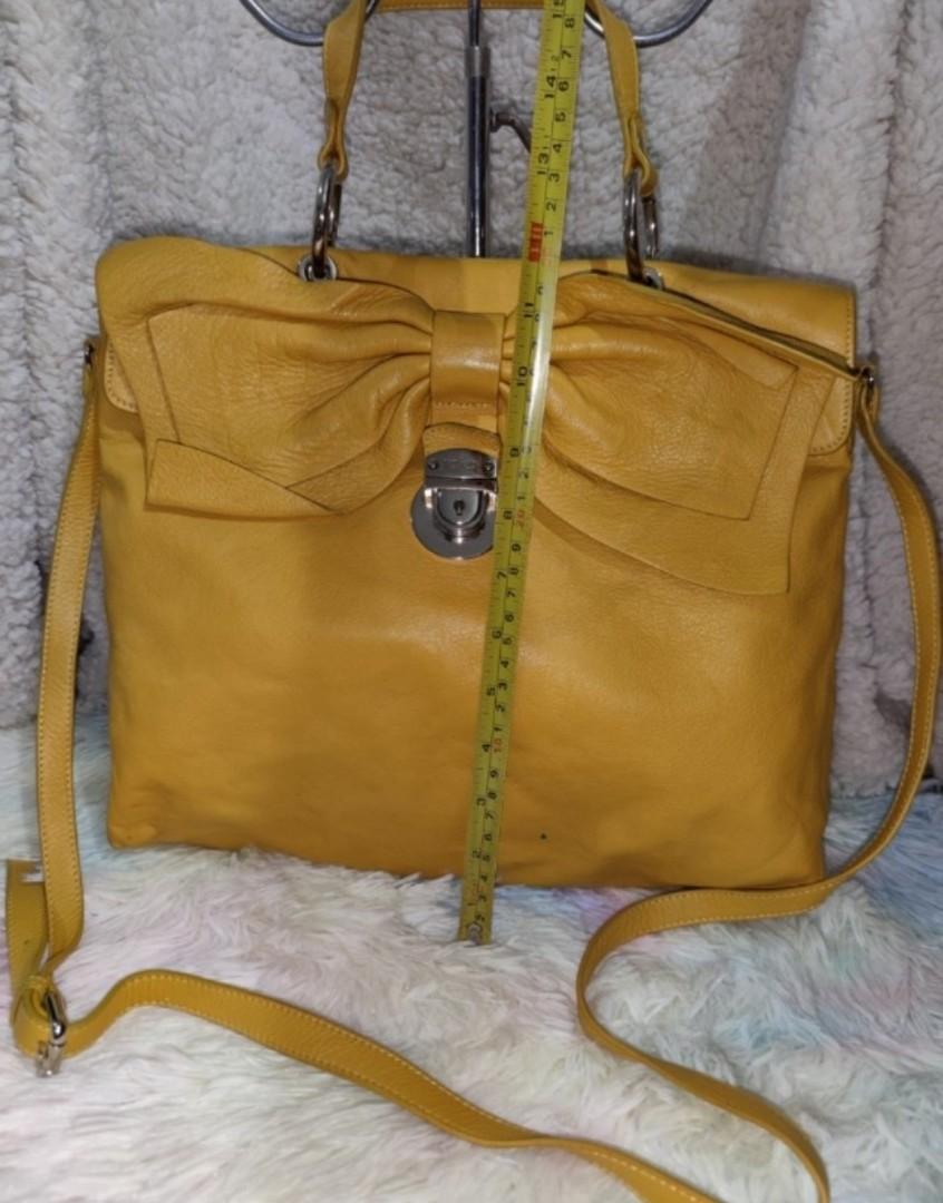 Red Valentino Bow Embellished Leather Bag (Category: Luxury Bags & Wallets) located in Pasig City. Submitted by armoire_deluxe (Listing ID 1112567188, Image 3). Description: Pre❤️ item. In good condition..