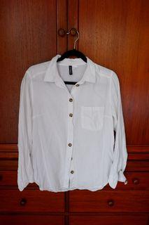 H&M White polo with tortoise shell buttons