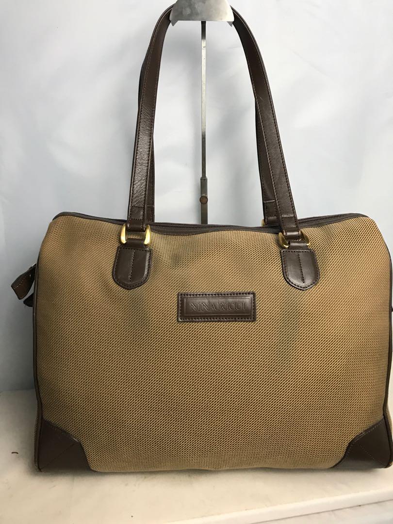 Auth nina ricci travel bag, Luxury, Bags & Wallets on Carousell