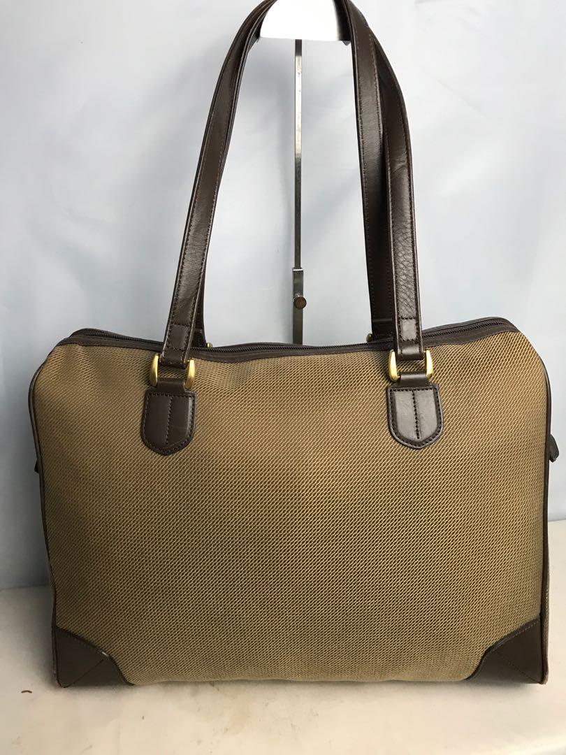 Auth nina ricci travel bag, Luxury, Bags & Wallets on Carousell