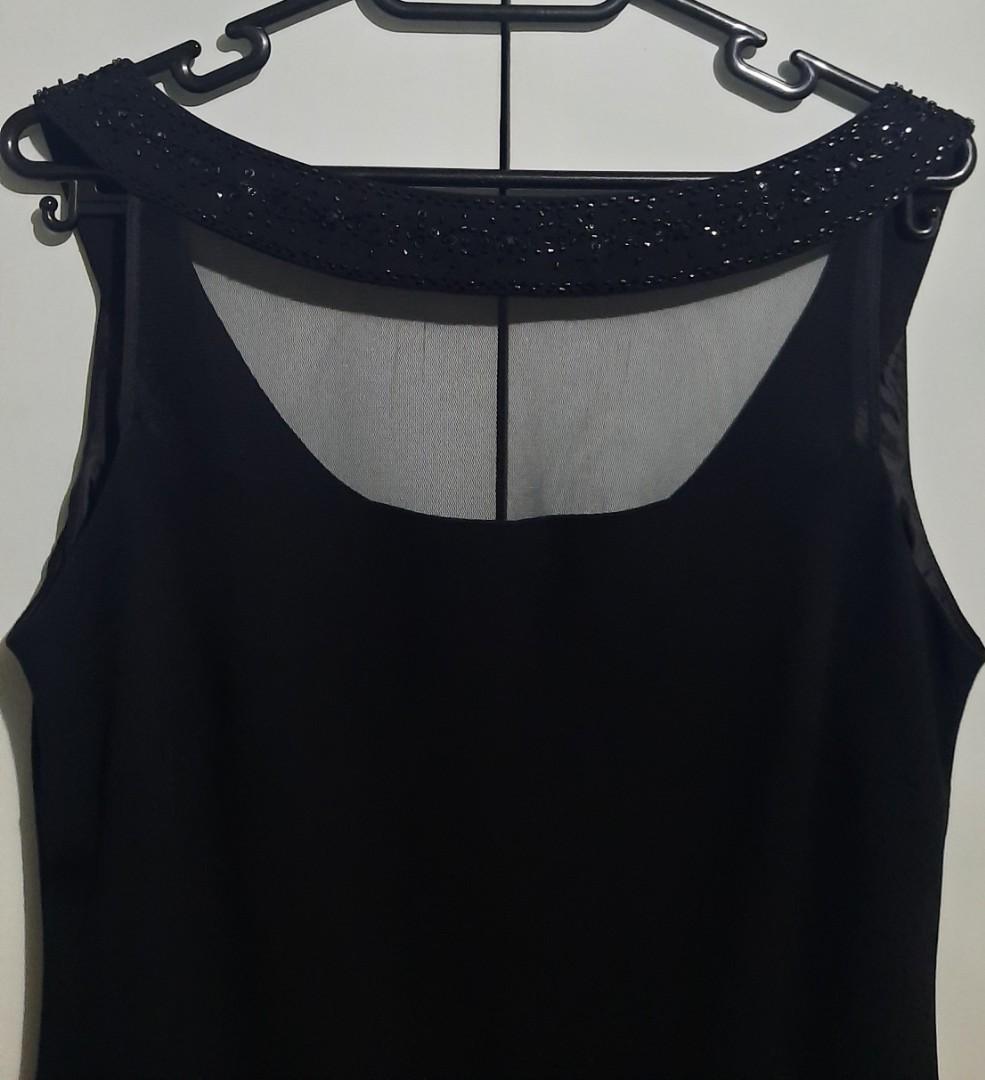 Black formal dress (Category: Evening dresses & gowns) located in Paranaque City. Submitted by conrich (Listing ID 1136501568, Image 2). Description: Decluterring Bought in the US. Bought and washed. Sheer neckline with black beadwork. Falls nicely on the body. You can haggle..