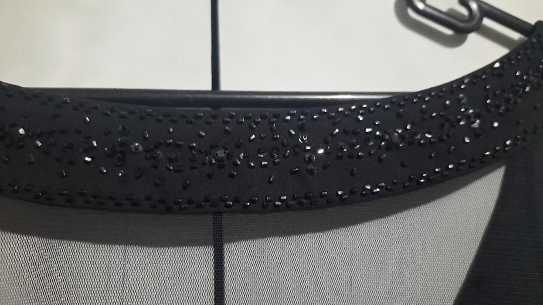 Black formal dress (Category: Evening dresses & gowns) located in Paranaque City. Submitted by conrich (Listing ID 1136501568, Image 3). Description: Decluterring Bought in the US. Bought and washed. Sheer neckline with black beadwork. Falls nicely on the body. You can haggle..