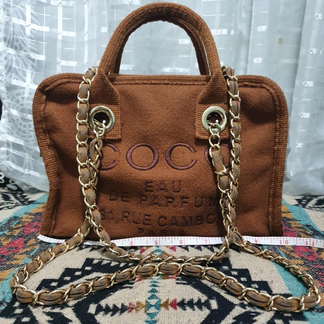 Coco Long Strap Chain Sling Shoulder Bag (Category: Shoulder Bags) located in Makati City. Submitted by _bcgs_ (Listing ID 1136650026, Image 1). Description: chain condition is 8/10. chain has a good weight to it (medyo makapal and mabigat). may konting fade pero hindi halata. leather in the chain is a bit dirty. pls zoom in on photos. the rest of the bag is in very good condition. no other issues. zipper opens and closes smooth like butter. made