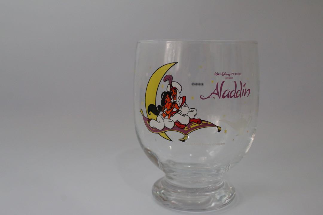 Disney Aladdin and Mickey Mouse Glasses (Category: Dinnerware & Cutlery) located in Quezon City. Submitted by irisandbarry (Listing ID 1136470394, Image 1). Description: 4.4”-H 3”-D (Aladdin) 3.5”-H 3.3”-D (Mickey Mouse).