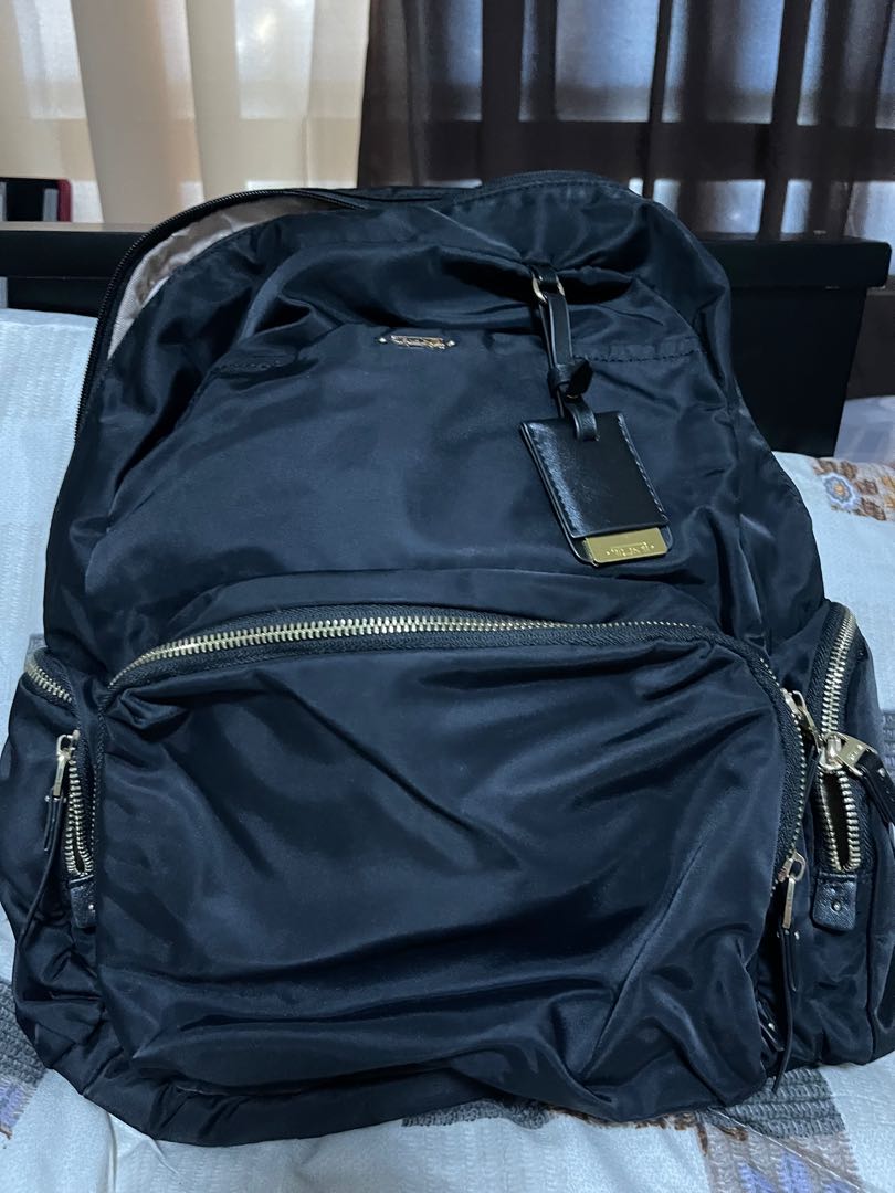 tumi backpack used