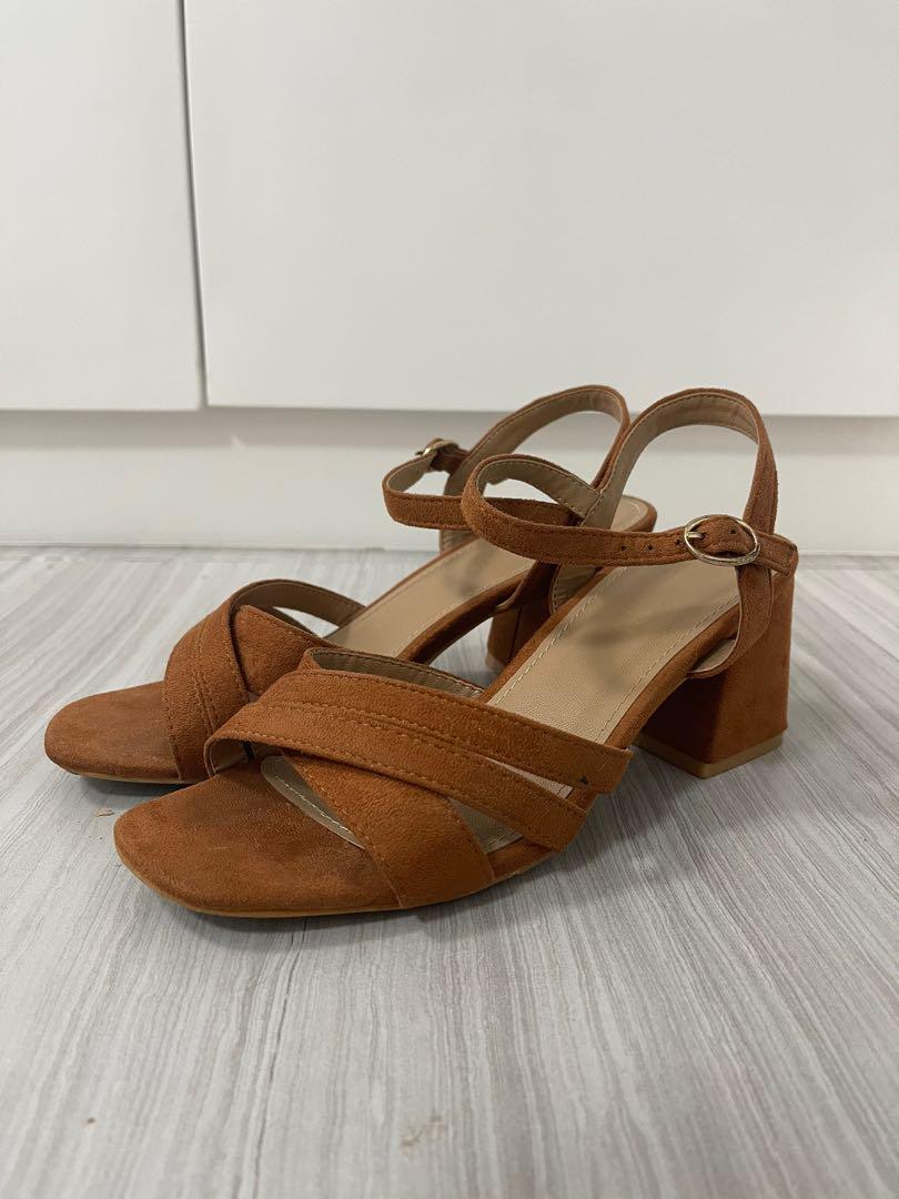 Criss Cross Sandals (Category: Sandals) located in Dasmarinas. Submitted by sisea (Listing ID 1136773169, Image 1). Description: Parisian Criss Cross warm brown sandals Size 6 2.5 inch heel height Feel free to message me for inquiries/questions. Shipping fee is care of buyer. Pay before shipment. MOP: GCASH .