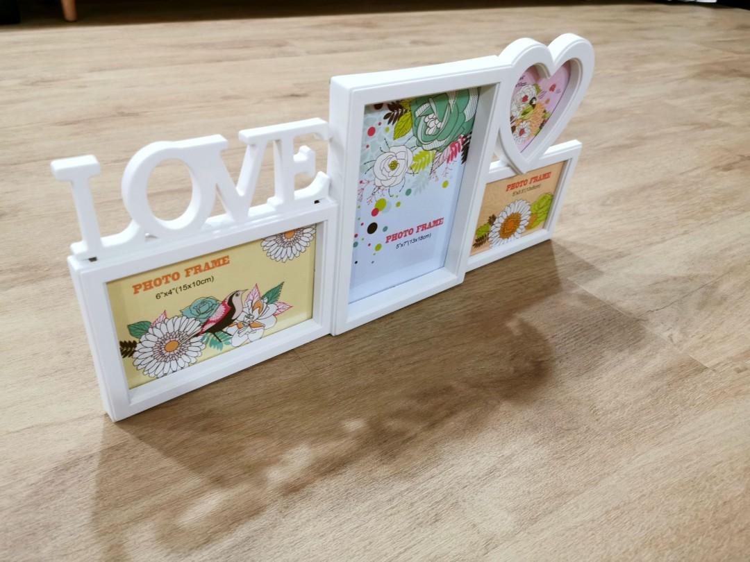 Photoframe - White (Category: Frames & Pictures) located in Singapore. Submitted by clara_mintymin (Listing ID 1136816747, Image 2). Description: Photoframe - White - comes with measurements for each box - can stand on its own - comes with hook for hanging to the wall * Meet up or top up for delivery *.