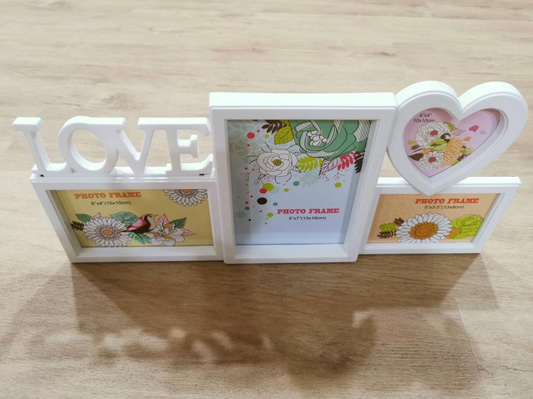 Photoframe - White (Category: Frames & Pictures) located in Singapore. Submitted by clara_mintymin (Listing ID 1136816747, Image 3). Description: Photoframe - White - comes with measurements for each box - can stand on its own - comes with hook for hanging to the wall * Meet up or top up for delivery *.