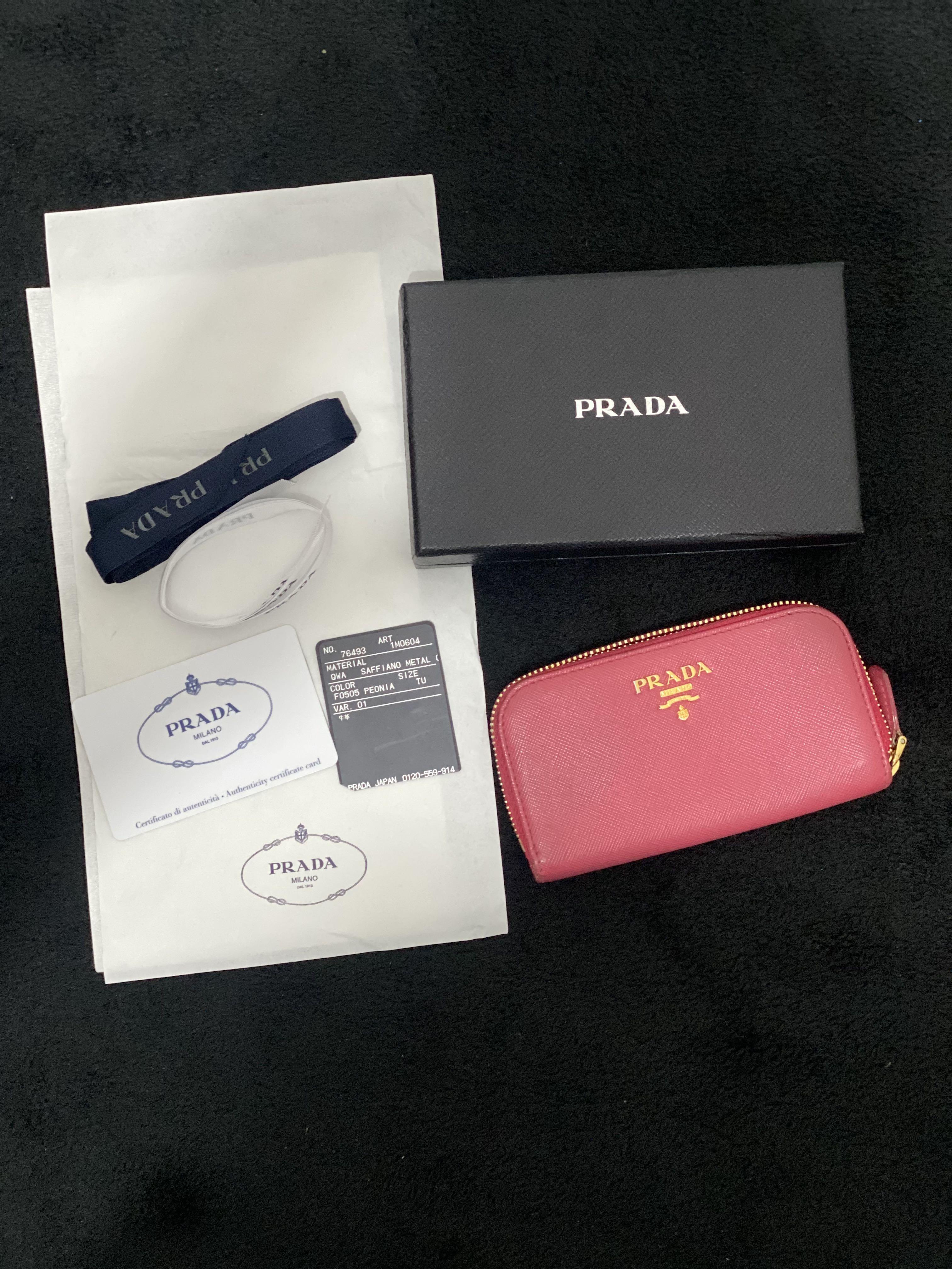 Prada Saffiano Zip 6 Key Case Holder (Category: Luxury Bags & Wallets) located in Paranaque City. Submitted by sillybella (Listing ID 1136727169, Image 1). Description: Original PRADA Saffiano Metal Zip Around 6 Key Holder Peonia (pink) 100% legit | Original Japan purchased (kyoto) Length: 5.5 in Width: 1 in Height: 2.75 in Issue: - dirt inside linisan nyo nlang libag lang yan due to usage Mag Mukhang pa sya bago pag na palinis ung loob. - light 