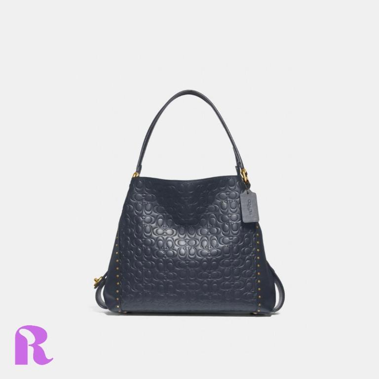 Edie shoulder bag 31 in best sale signature canvas with rivets