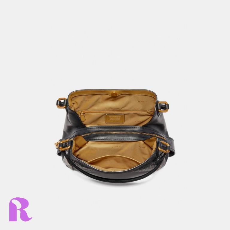 Edie shoulder bag 31 new arrivals in signature canvas with rivets