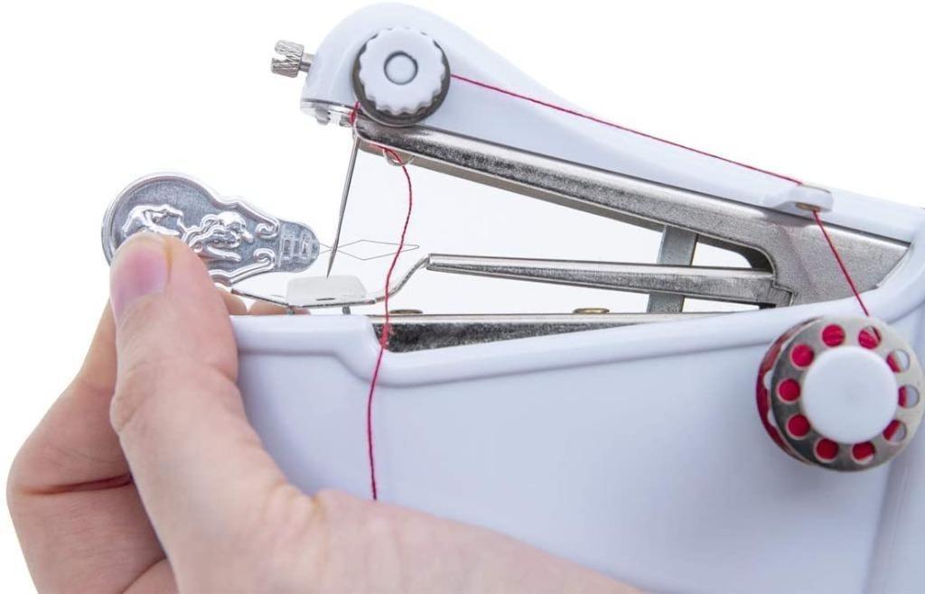 JML  Magic Stitch - Hand-held, portable sewing machine for on-the-spot  repairs and alterations