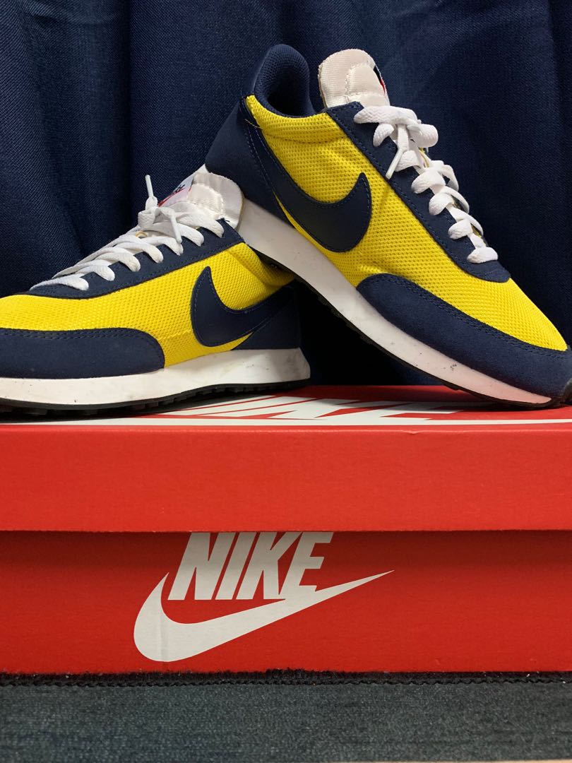 Yellow nike tailwind sale