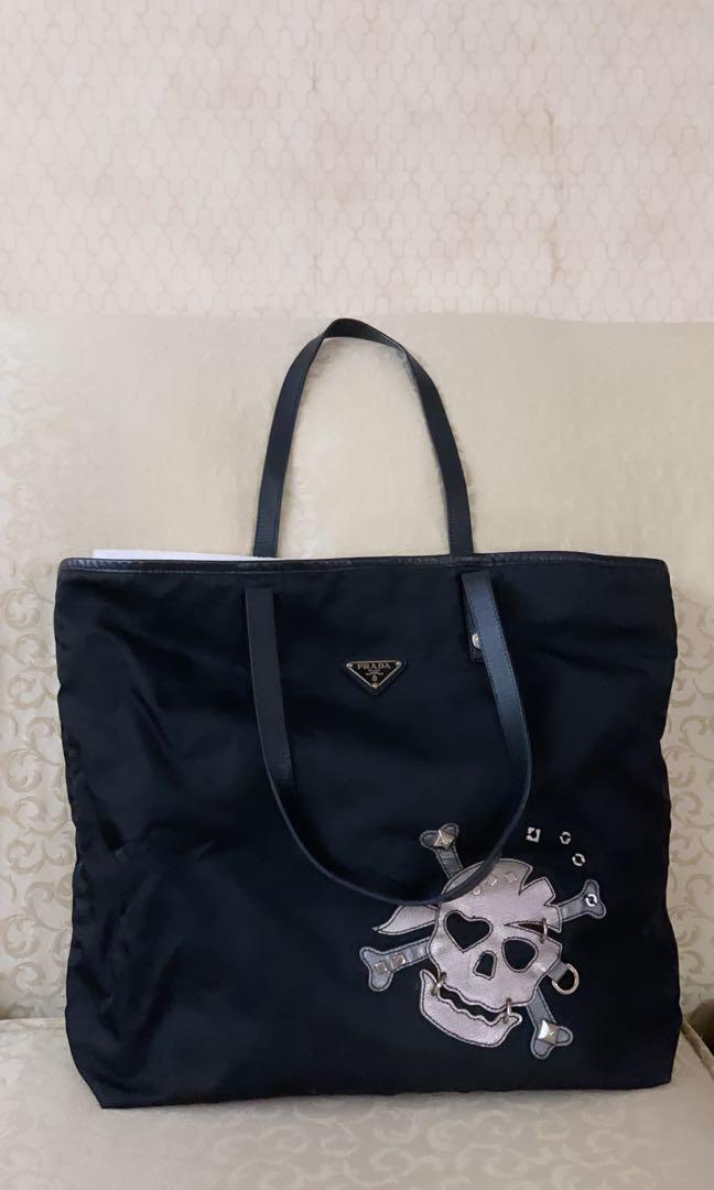 Prada Skull Nylon Tote Bag (Category: Luxury Bags & Wallets) located in Quezon City. Submitted by envti (Listing ID 1136921832, Image 1). Description: Unisex prada tote. Bought in HK airport. Very light tote. Perfect for traveling. A bit crumpled so you will have to stuff it for it to go back to shape.