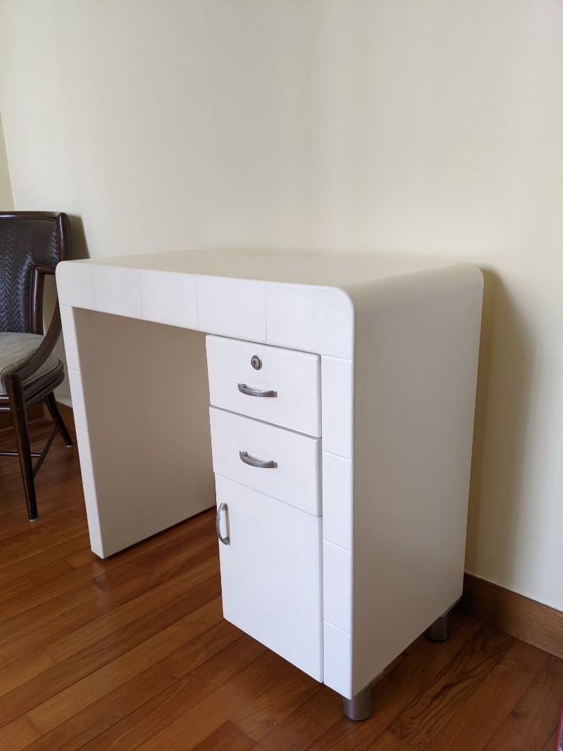 Small desk (Category: Other Home Furniture) located in Singapore. Submitted by dliu22 (Listing ID 1136867236, Image 2). Description: Barely used small desk with rounded ends. Sturdy build, contemporary look. Drawers open and close smoothly. Width: 84cm x Depth: 38cm x Height: 76cm..
